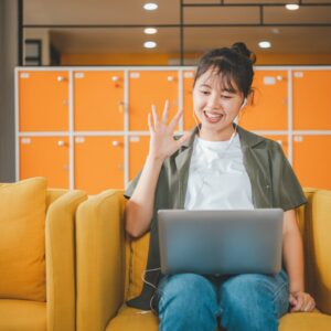 Teenage Asian are communicating through video conferencing for online learning