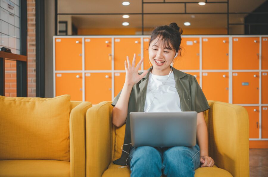 Teenage Asian are communicating through video conferencing for online learning