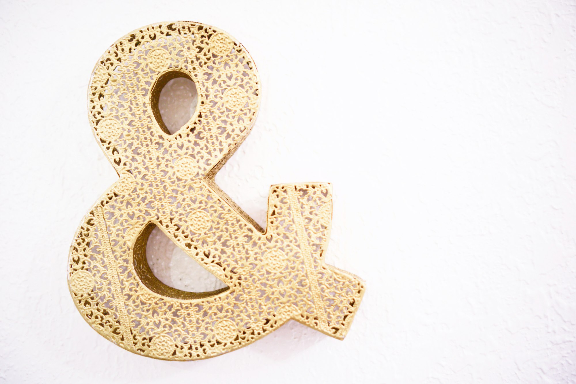 Ampersand “and” sign in gold